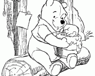 Dessin de Winnie mange du miel 